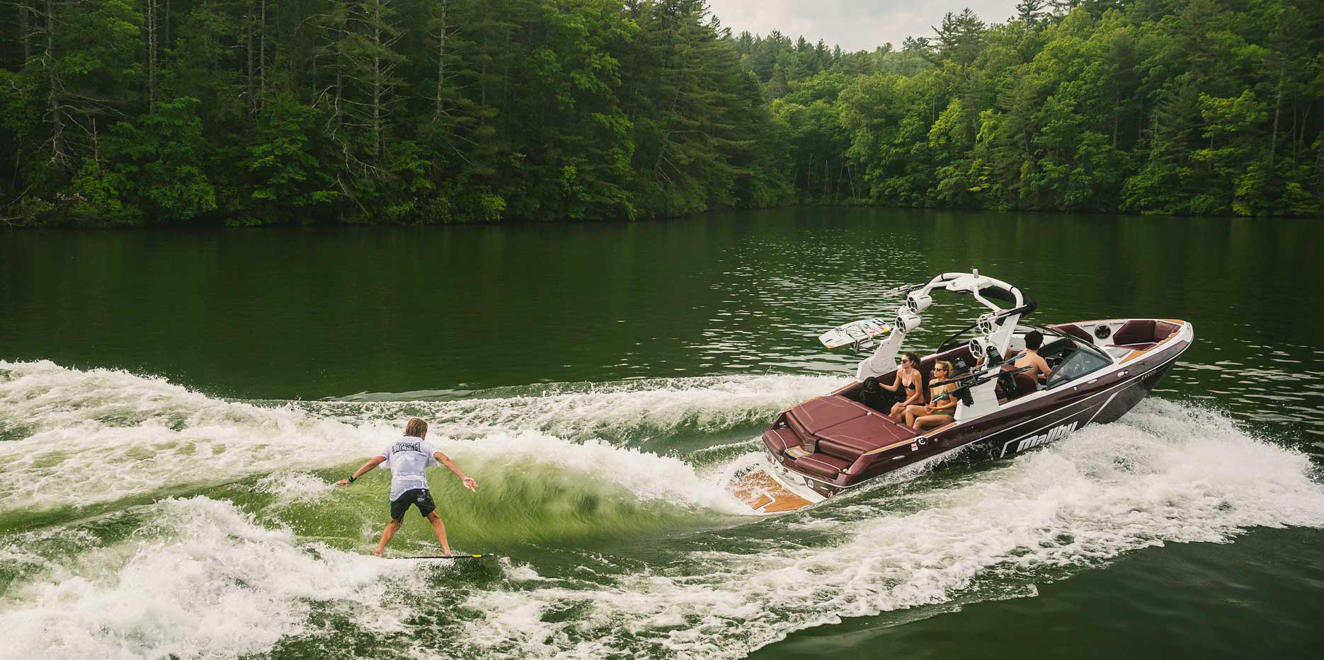 Wakesurfing behind the 22 LSV is a breeze with the Integrated Surf Platform.
