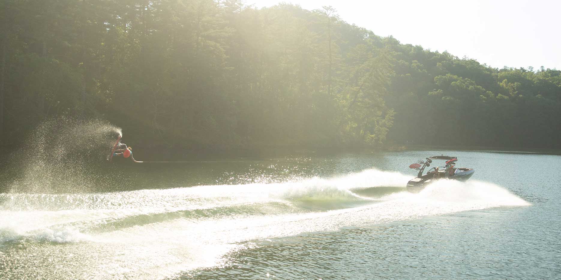 Wakeboarding behind the Malibu Boats 22 MXZ