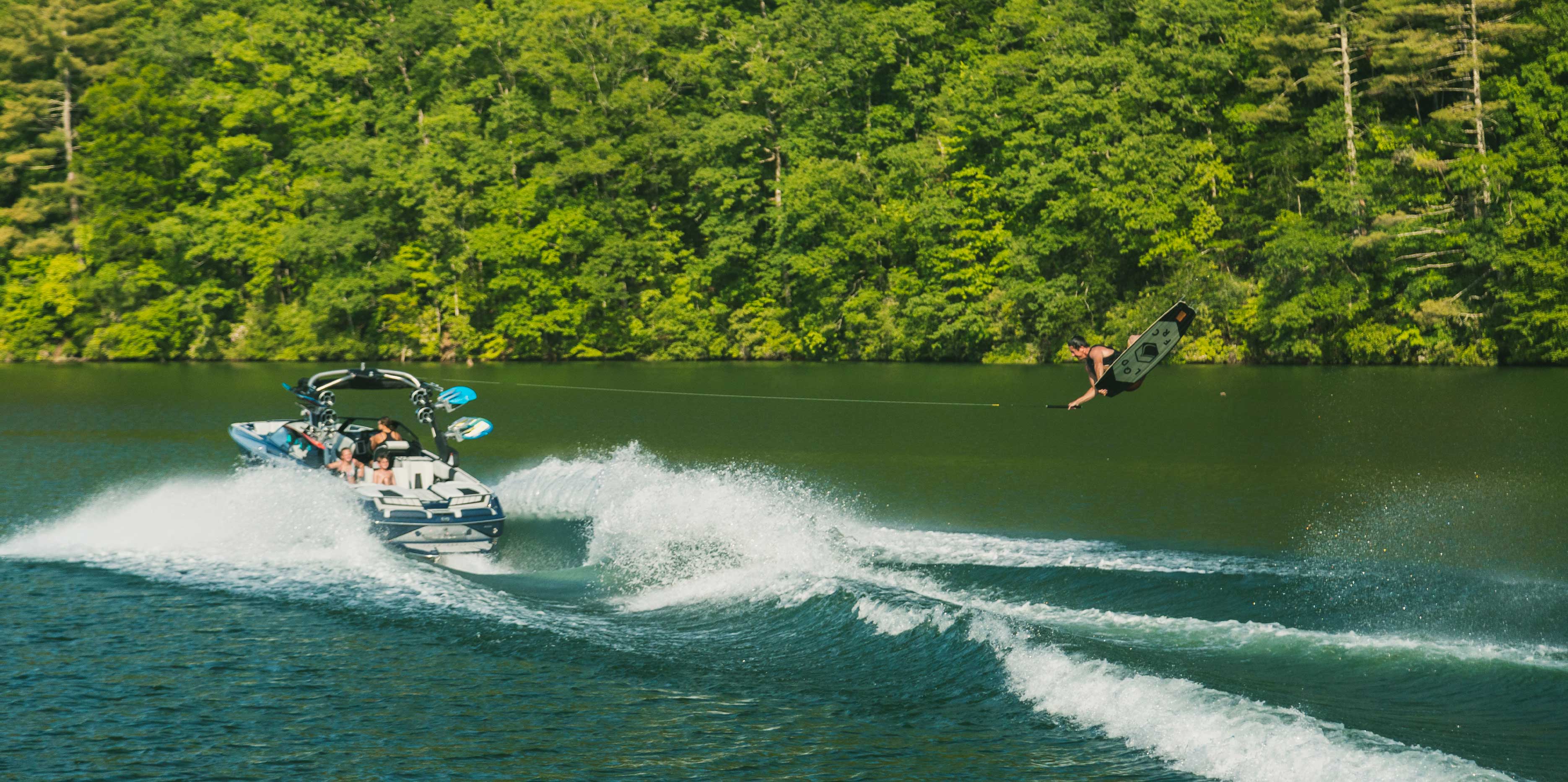 Wakeboaring behind the Malibu 24 MXZ