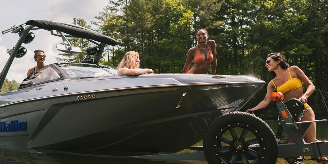 4 Women launching a Malibu boat