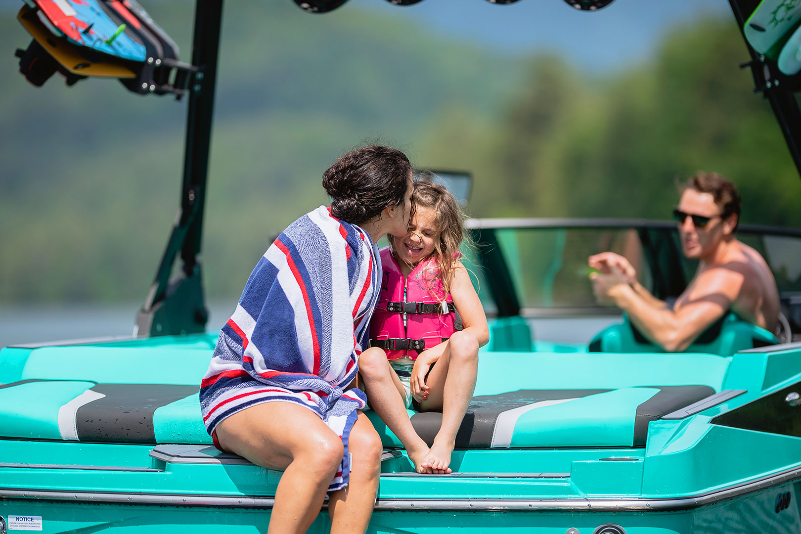 Mother & Daughter Hanging Out on Transom of Axis T220