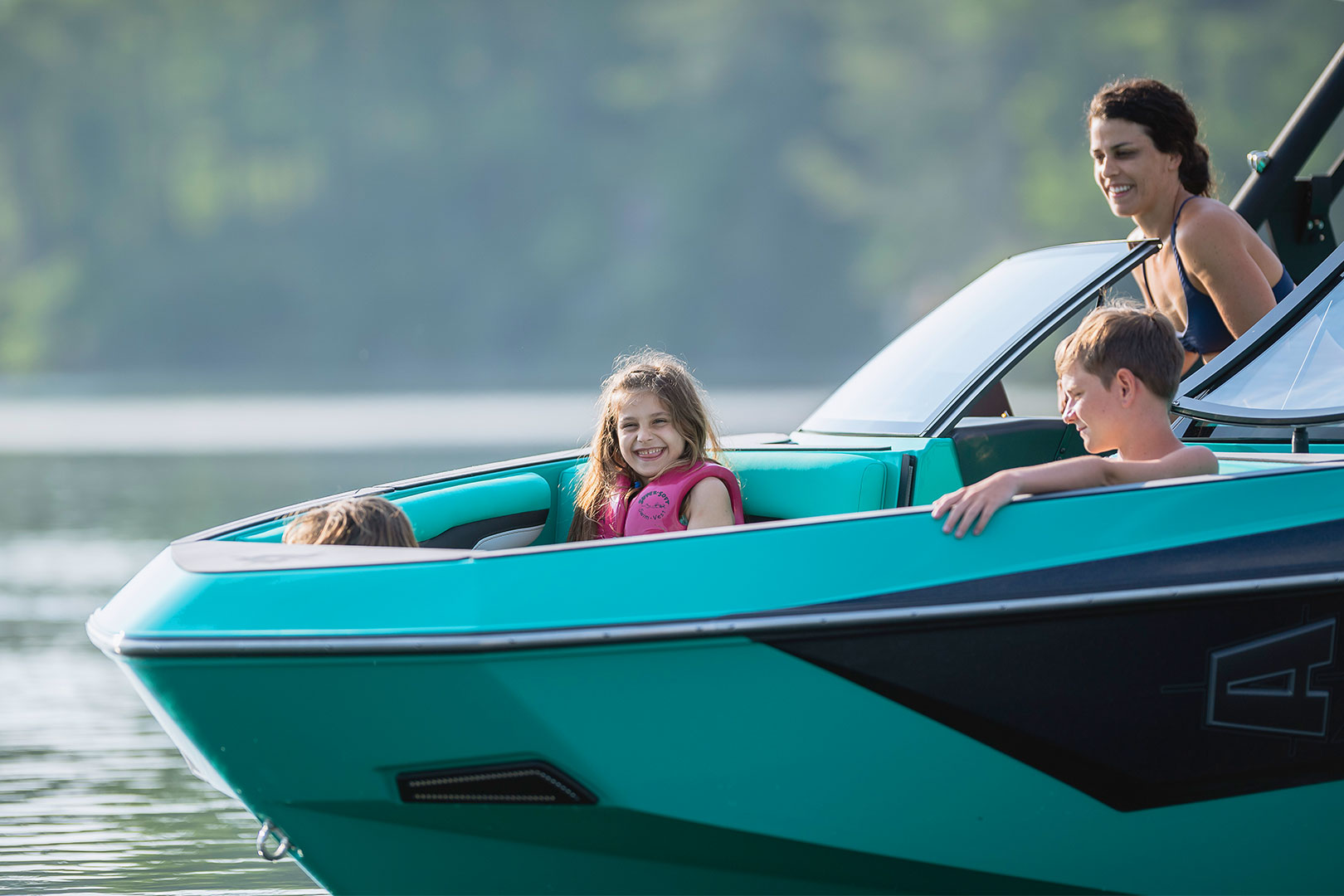 Kids Riding in Traditional Bow of Axis T220