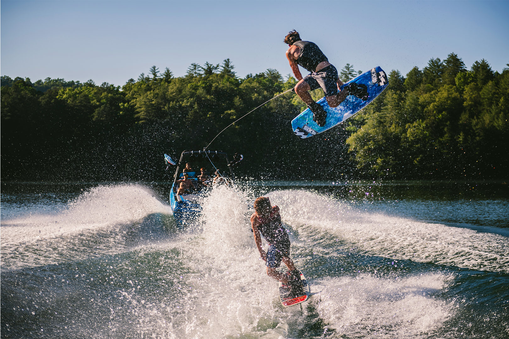 Brothers Wakeboarding Behind Axis T23