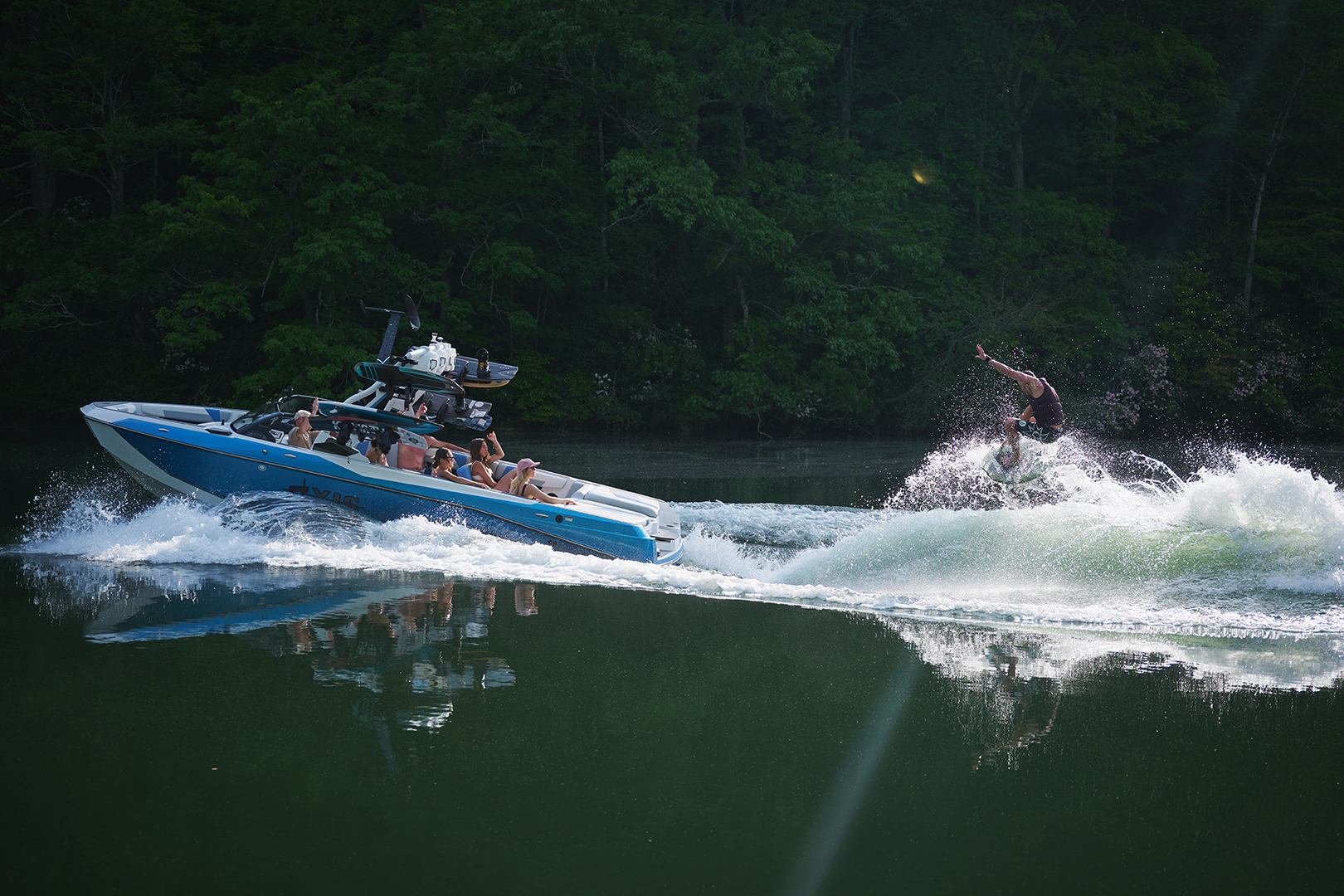 Portside view of Johnny Stieg surfing a well-shaped wave behind the Axis T250.