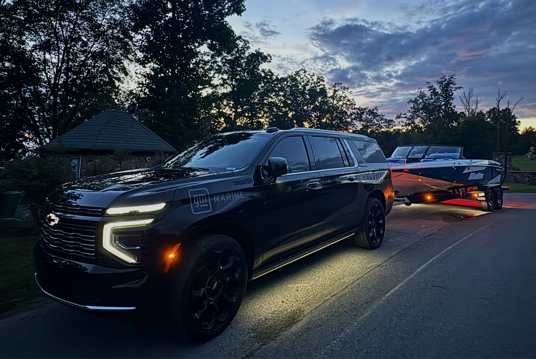 Chevy Suburban 2026 Model Towing Malibu Boat